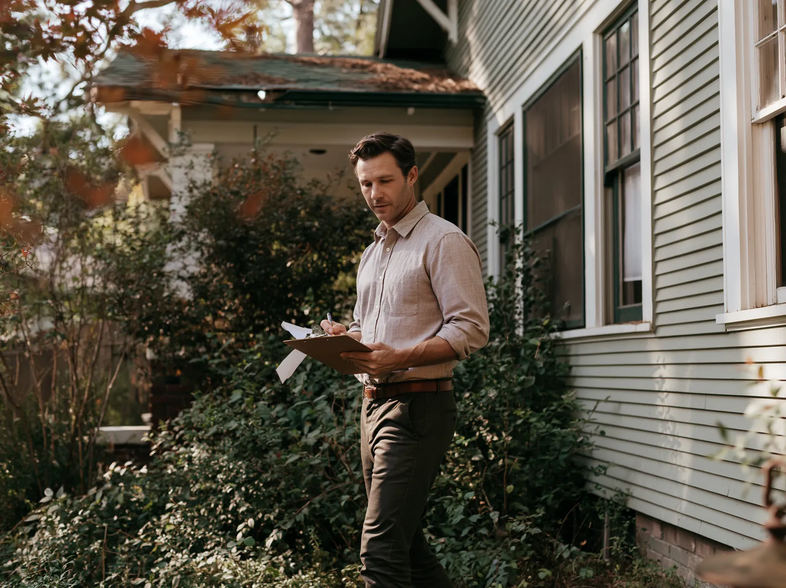 Cash house buyer evaluating a teardown-candidate property in Fresno